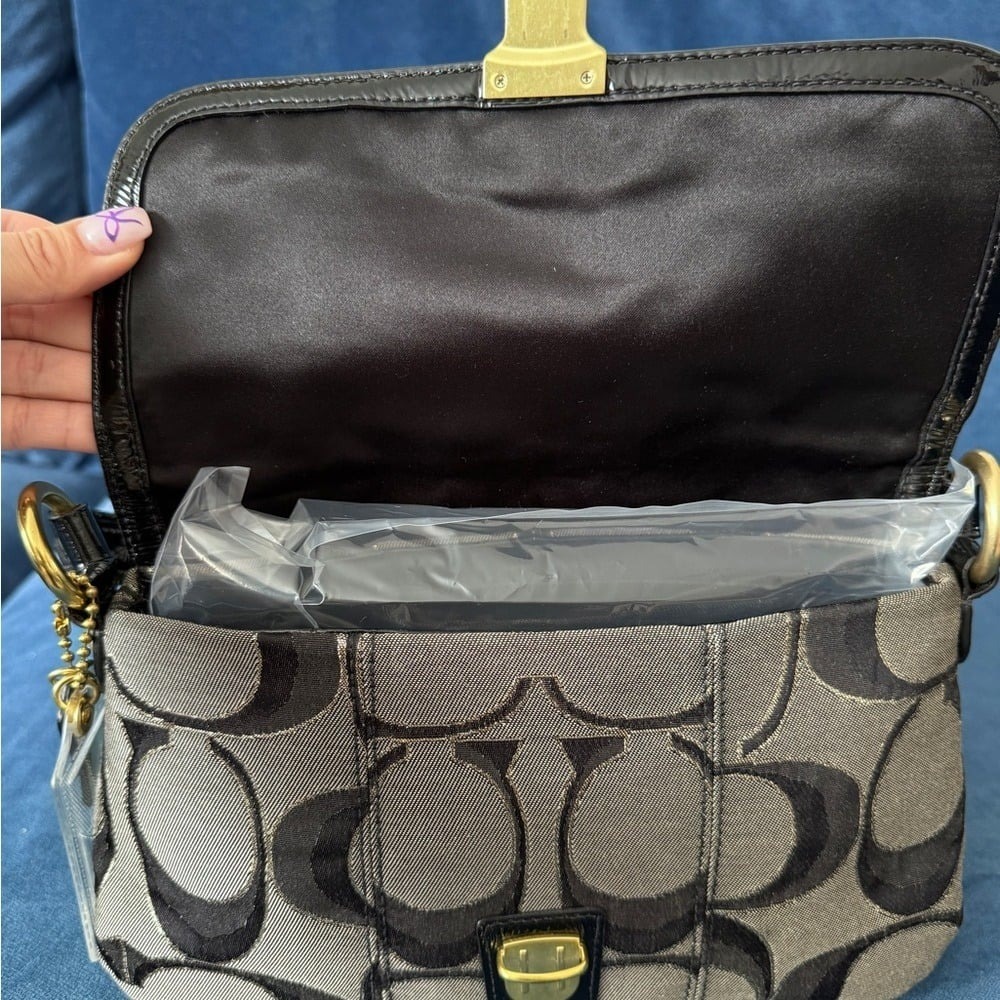Coach
Coach Black/Grey Signature Canvas and
Patent‎ Leather Shoulder Bag - Picture 7 of 12